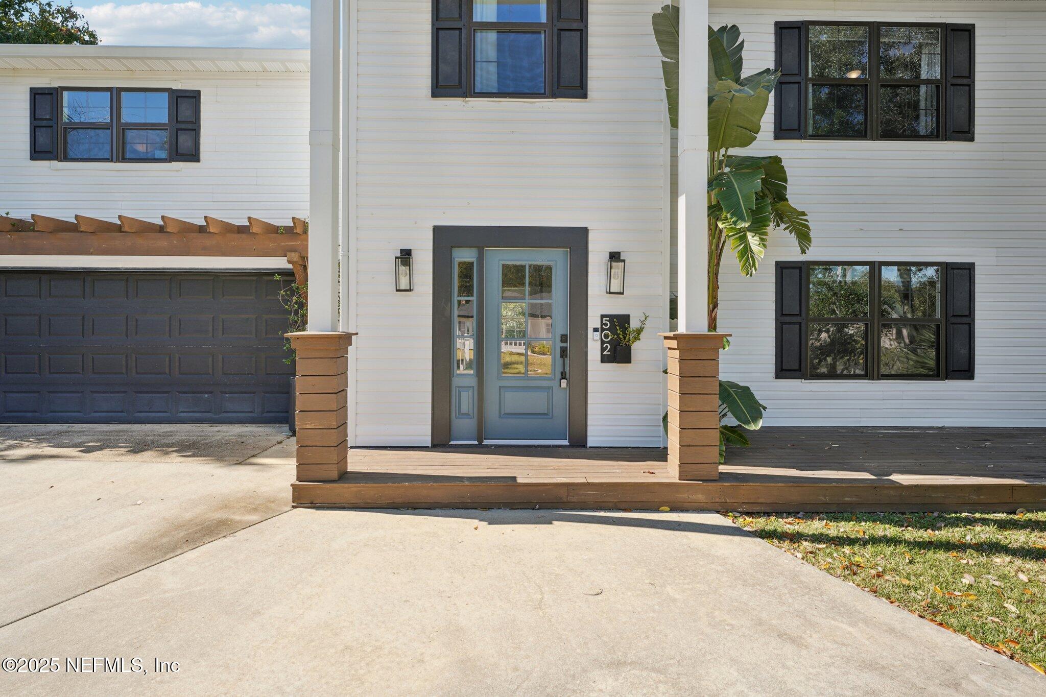 502 Royal Road St. Augustine, FL 32086 - Photo 2 of 34 a front view of a house with a yard