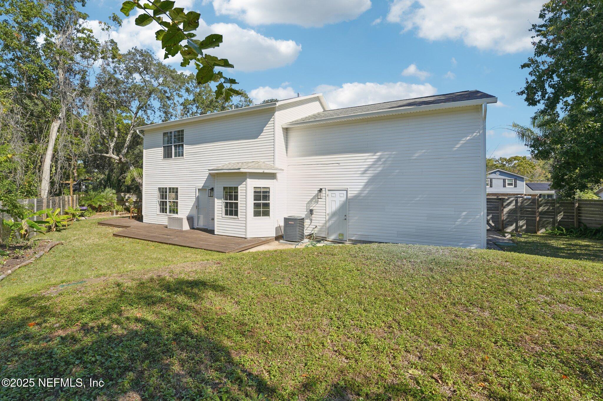 502 Royal Road St. Augustine, FL 32086 - Photo 30 of 34 a view of a house with a backyard
