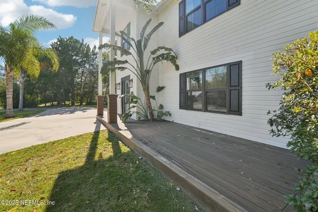 a house with trees in front of it