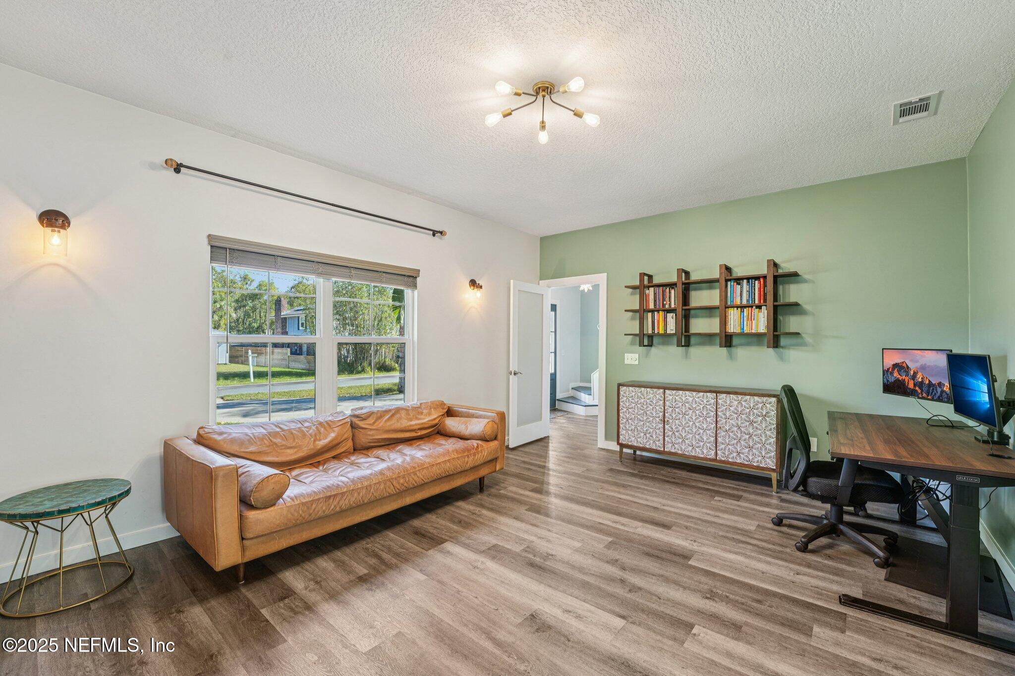 502 Royal Road St. Augustine, FL 32086 - Photo 5 of 34 a living room with furniture and a window
