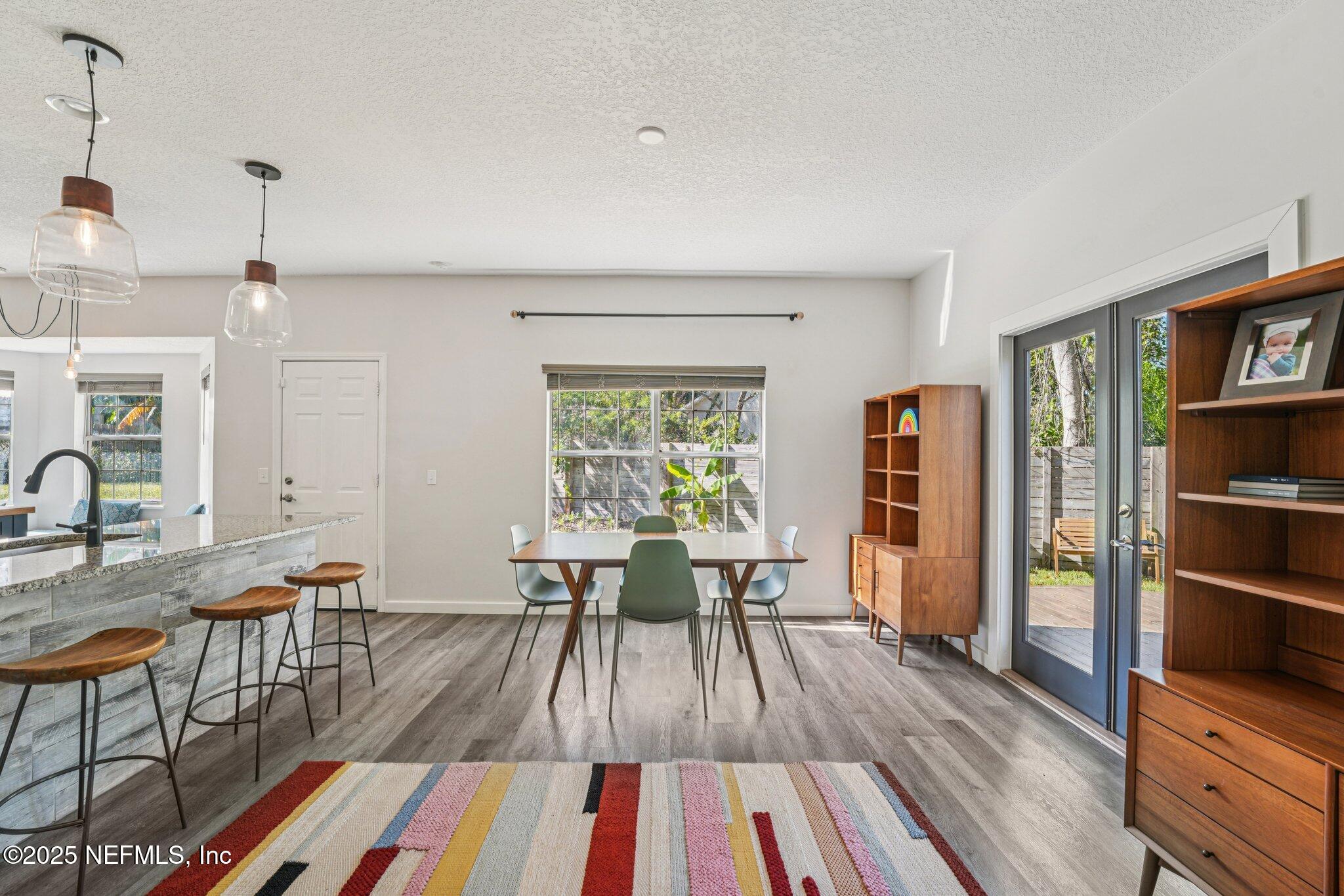 502 Royal Road St. Augustine, FL 32086 - Photo 6 of 34 a dining room with furniture and wooden floor