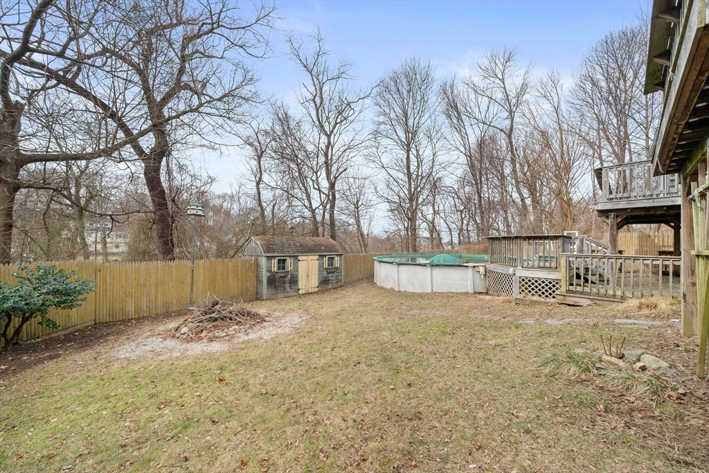 79 Pecksuot Road Weymouth, MA 02191 - Photo 29 of 42 a view of backyard with large tree