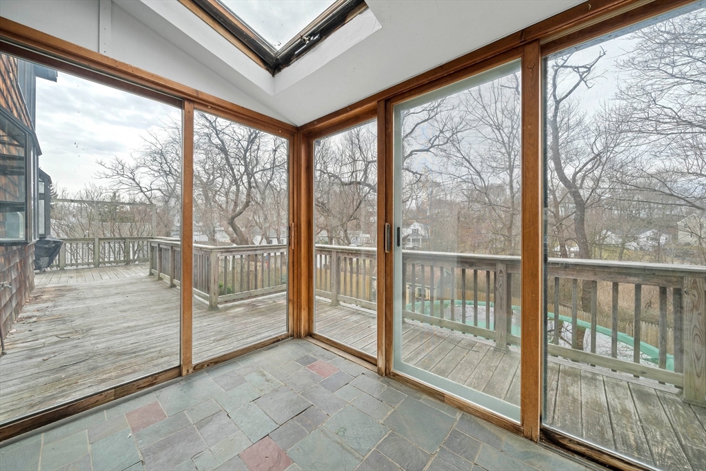 79 Pecksuot Road Weymouth, MA 02191 - Photo 8 of 42 a view of a room with wooden floor and a balcony