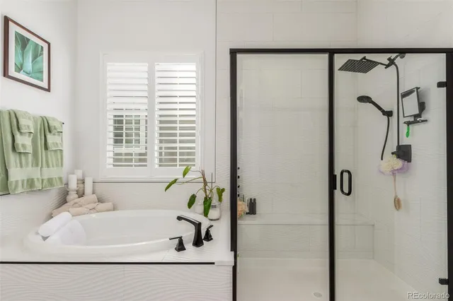a view of a workspace with furniture and a chandelier