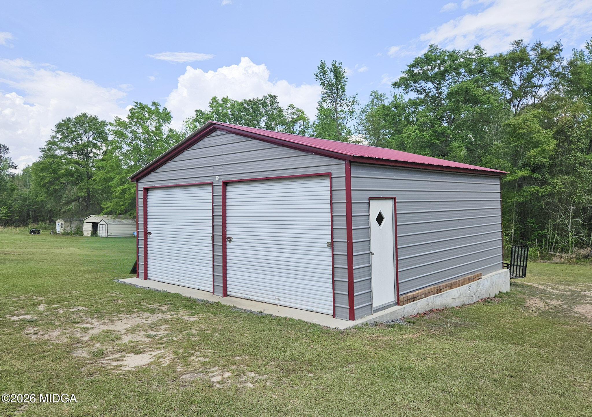 140 Chapman Ridge Road Macon, GA 31211 - Photo 36 of 37 a front view of a house with a yard