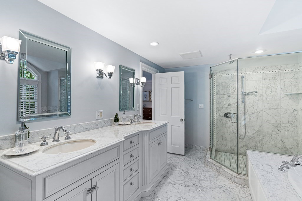 138 Hampshire Road Wellesley, MA 02481 - Photo 16 of 25 a bathroom with a double vanity sink mirror double and shower