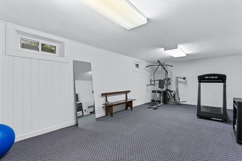 138 Hampshire Road Wellesley, MA 02481 - Photo 20 of 25 a view of a livingroom with furniture and a hallway