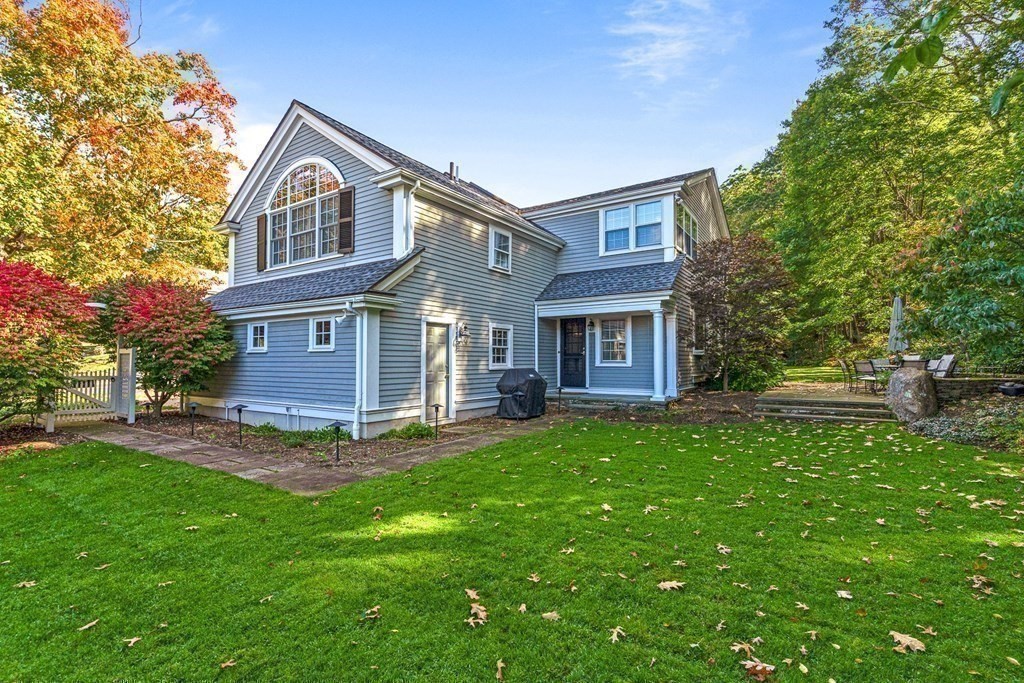 138 Hampshire Road Wellesley, MA 02481 - Photo 23 of 25 a front view of a house with a yard