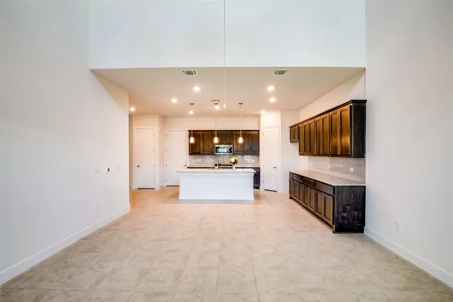 a view of living room with furniture and a flat screen tv