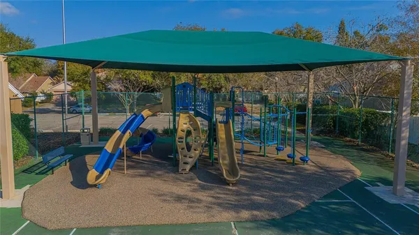 a view of a park with a slide