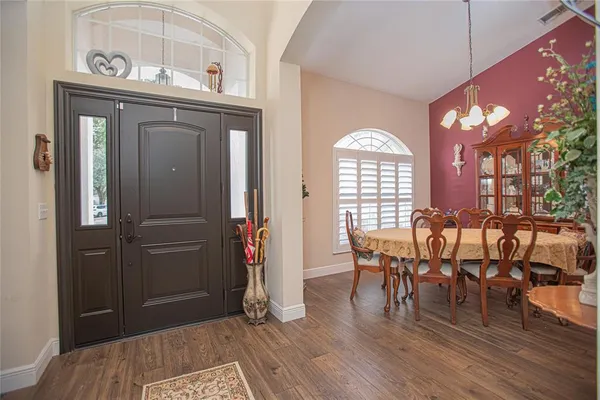 a view of a livingroom with furniture and window
