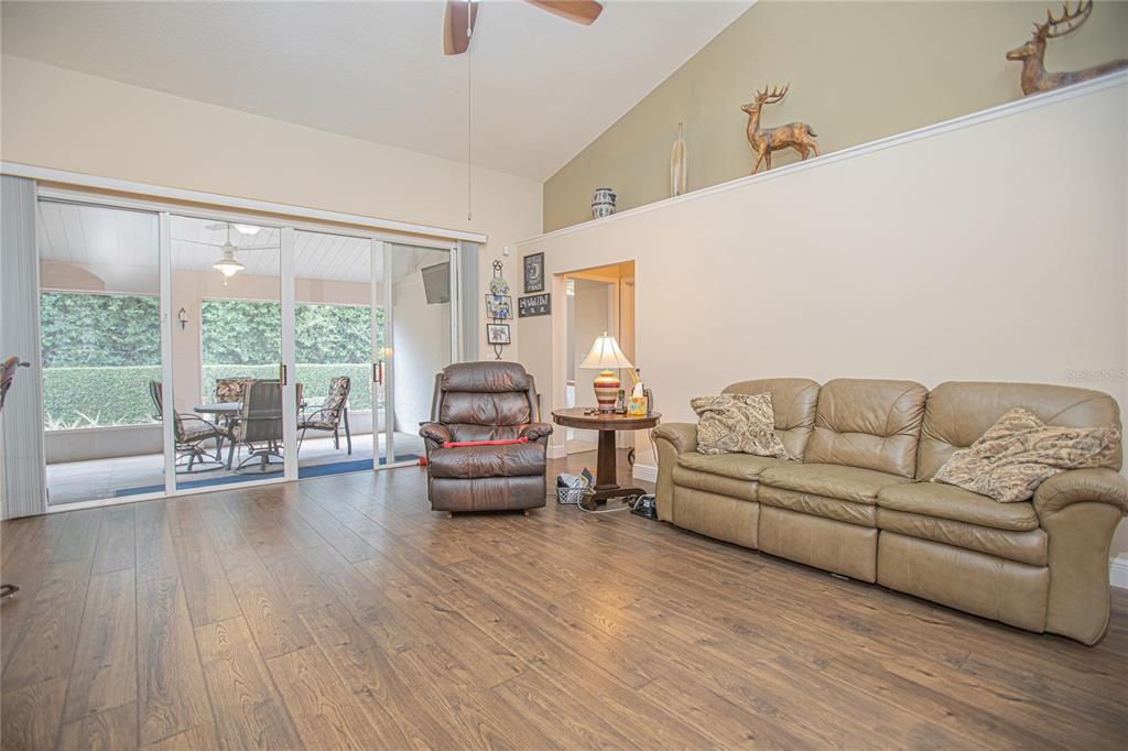 3321 Furlong Way Gotha, FL 34734 - Photo 9 of 26 a living room with furniture and a large window
