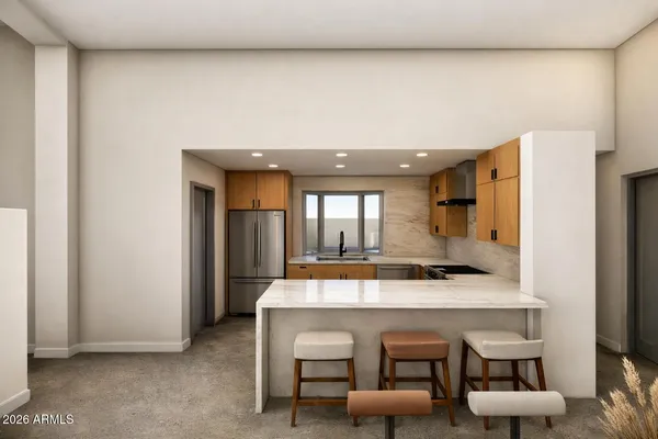 a kitchen with a stove and a white cabinets