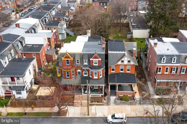 an aerial view of multi story residential apartment building