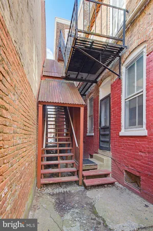 a view of a backyard of a house