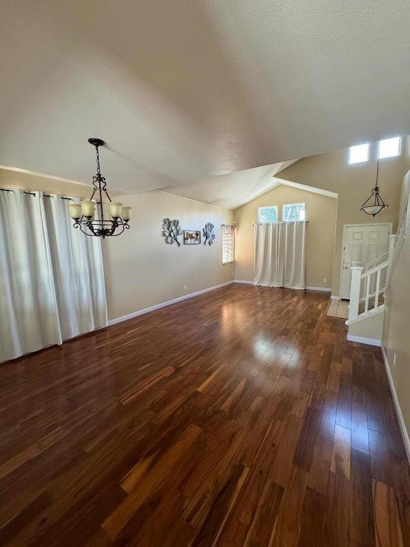 949 Terraza Street Soledad, CA 93960 - Photo 3 of 38 a view of a room with wooden floor