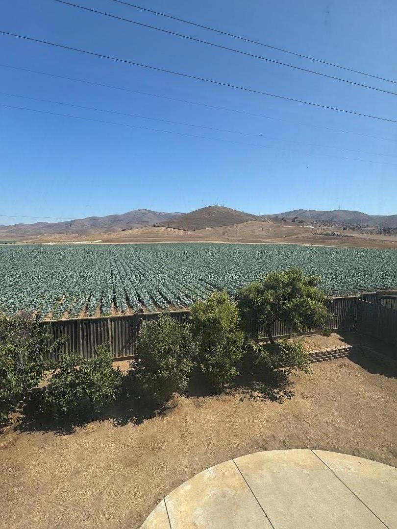 949 Terraza Street Soledad, CA 93960 - Photo 32 of 38 a view of a lake with a mountain