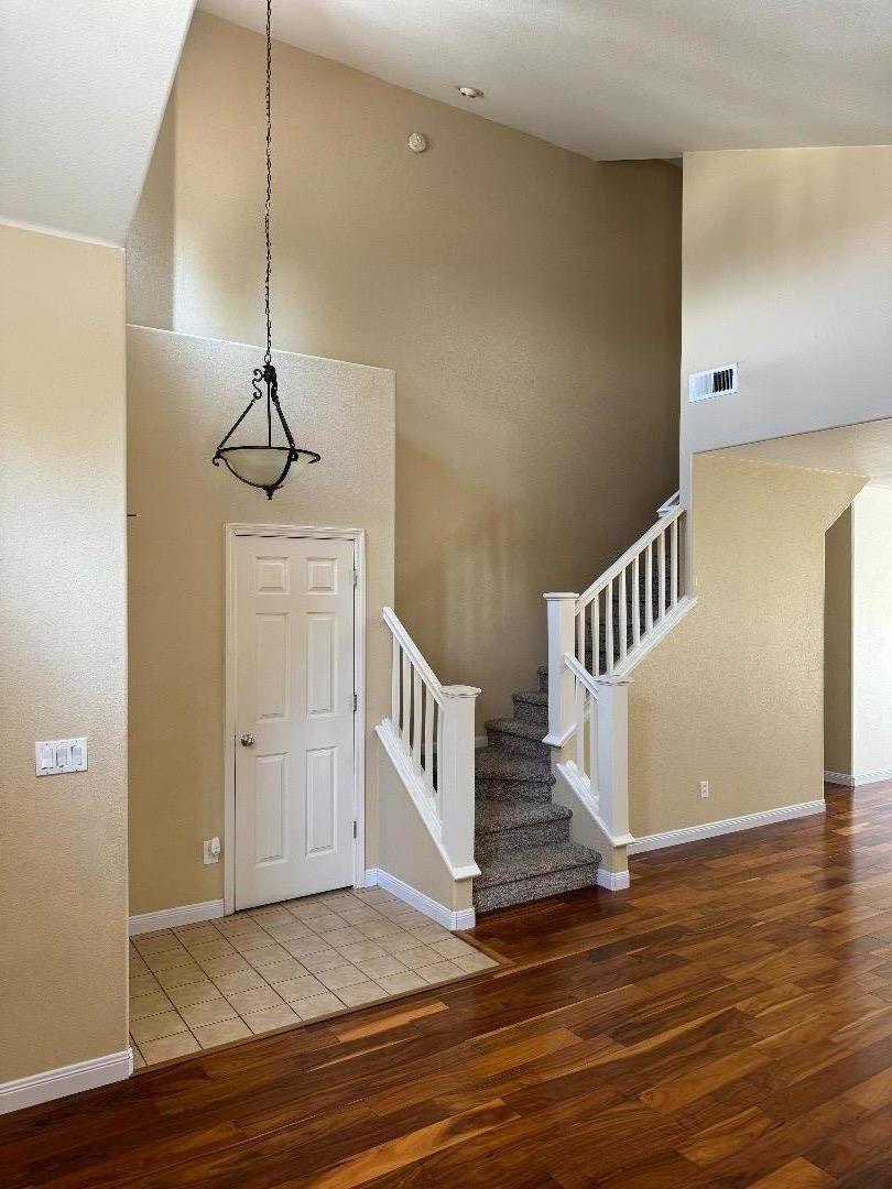 949 Terraza Street Soledad, CA 93960 - Photo 4 of 38 a view of an entryway with wooden floor