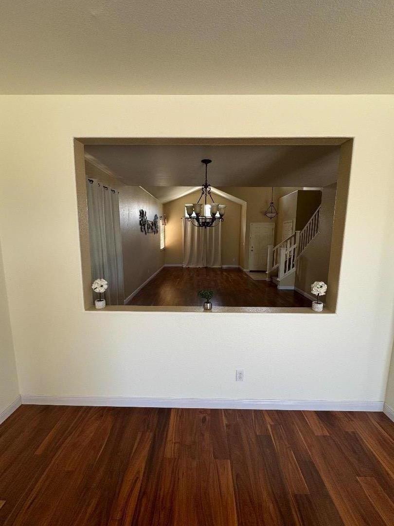 949 Terraza Street Soledad, CA 93960 - Photo 7 of 38 a view of a living room with wooden floor