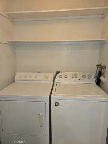 a kitchen with a stove and a microwave