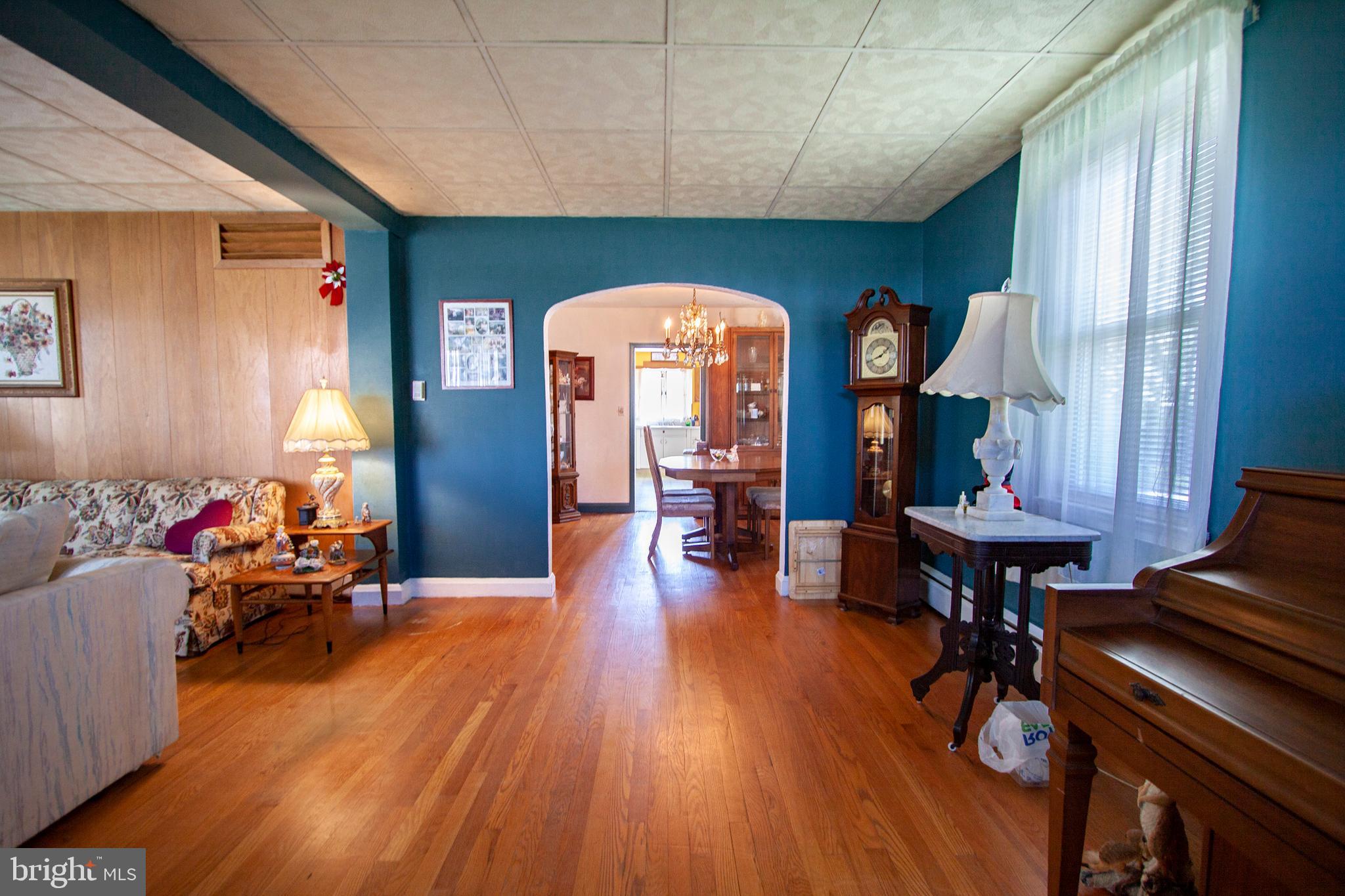 4703 Forge Road Perry Hall, MD 21128 - Photo 25 of 47 a living room with furniture and wooden floors