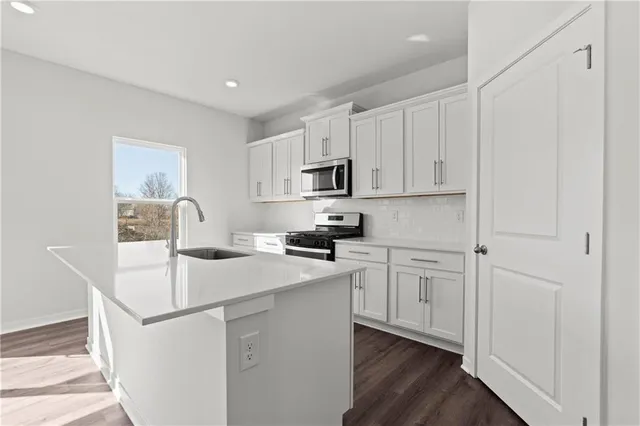 $389,990 | 614 Fallen Leaf Drive, Belton, MO 64012