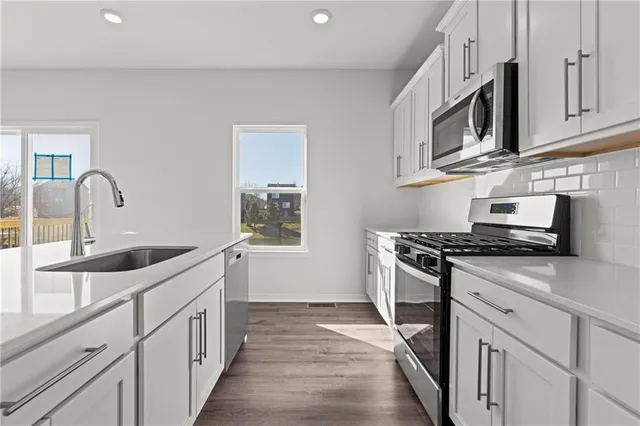 $389,990 | 614 Fallen Leaf Drive, Belton, MO 64012