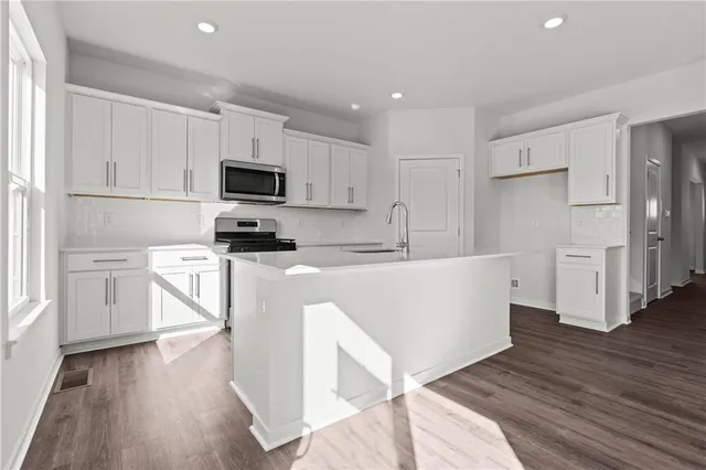 $399,990 | 614 Fallen Leaf Drive, Belton, MO 64012