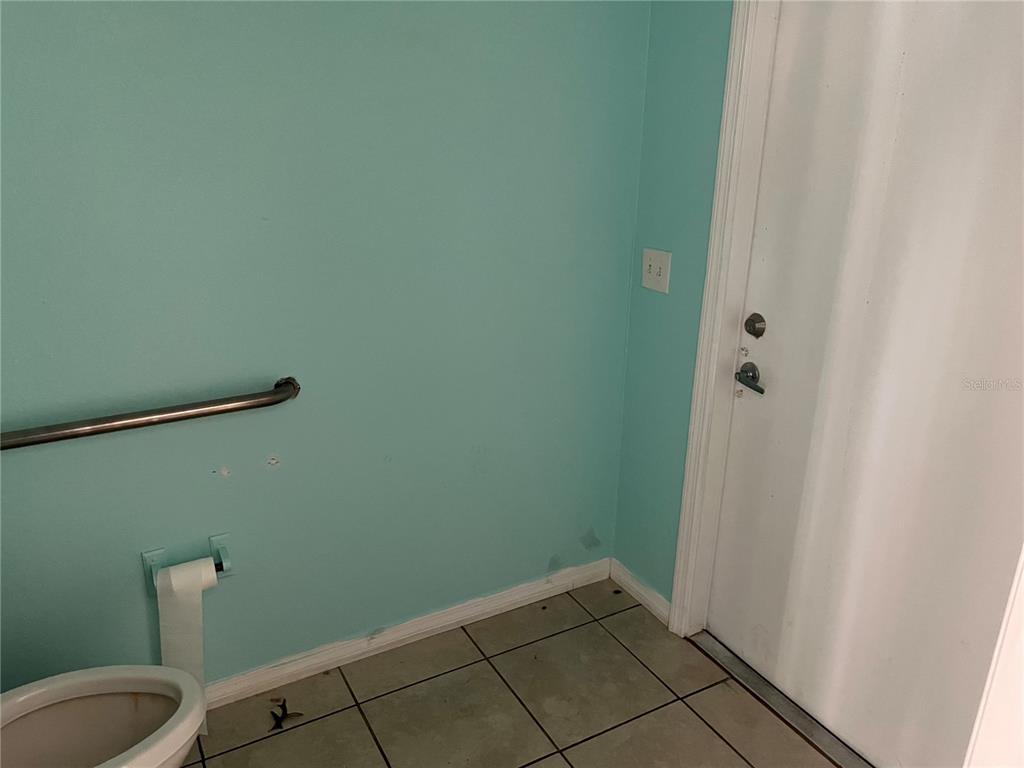 18132 Commercial Way Weeki Wachee, FL 34614 - Photo 17 of 22 a view of a bathroom
