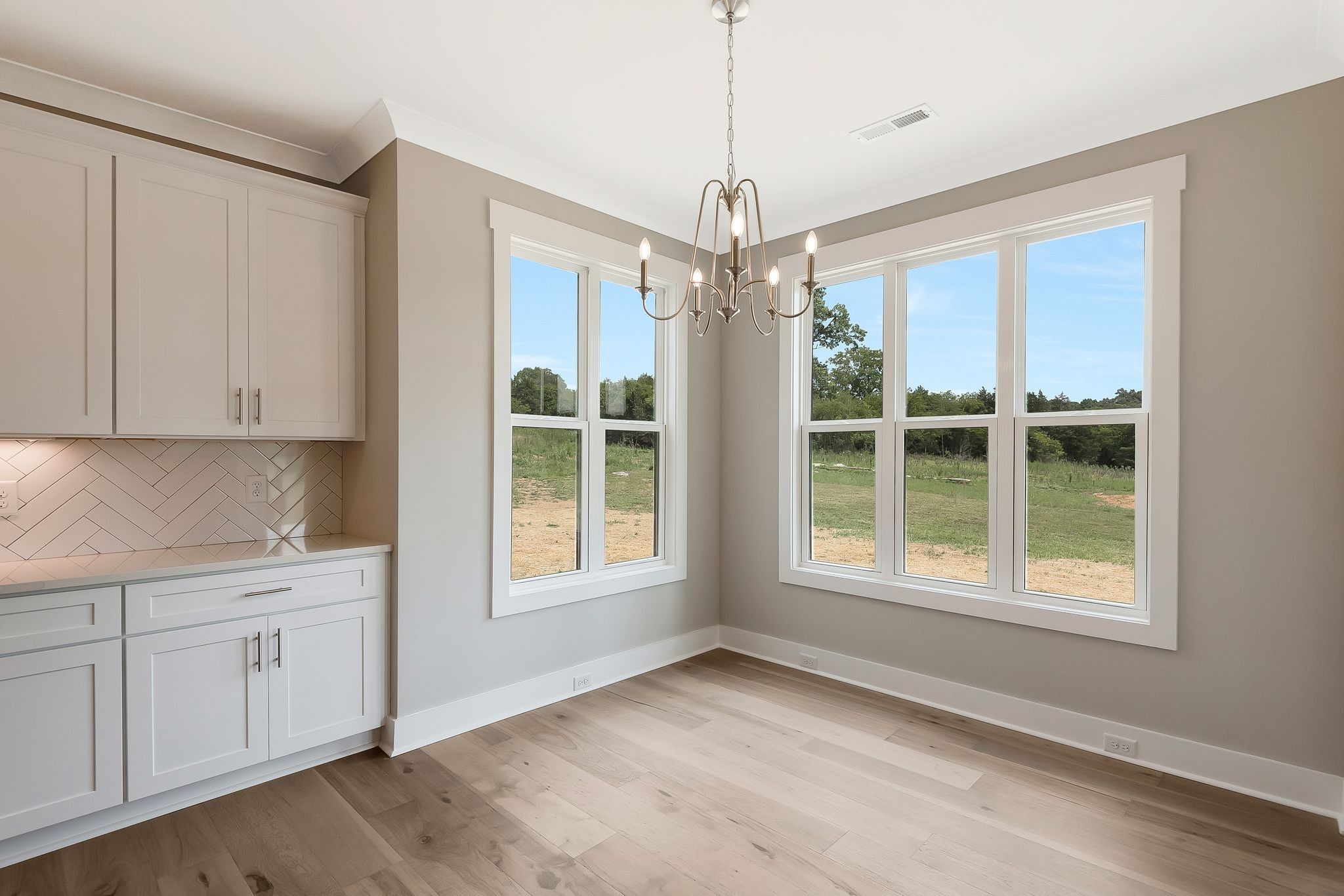 4114 Chicken Road Lebanon, TN 37090 - Photo 20 of 52 a view of an empty room with a window and chandelier