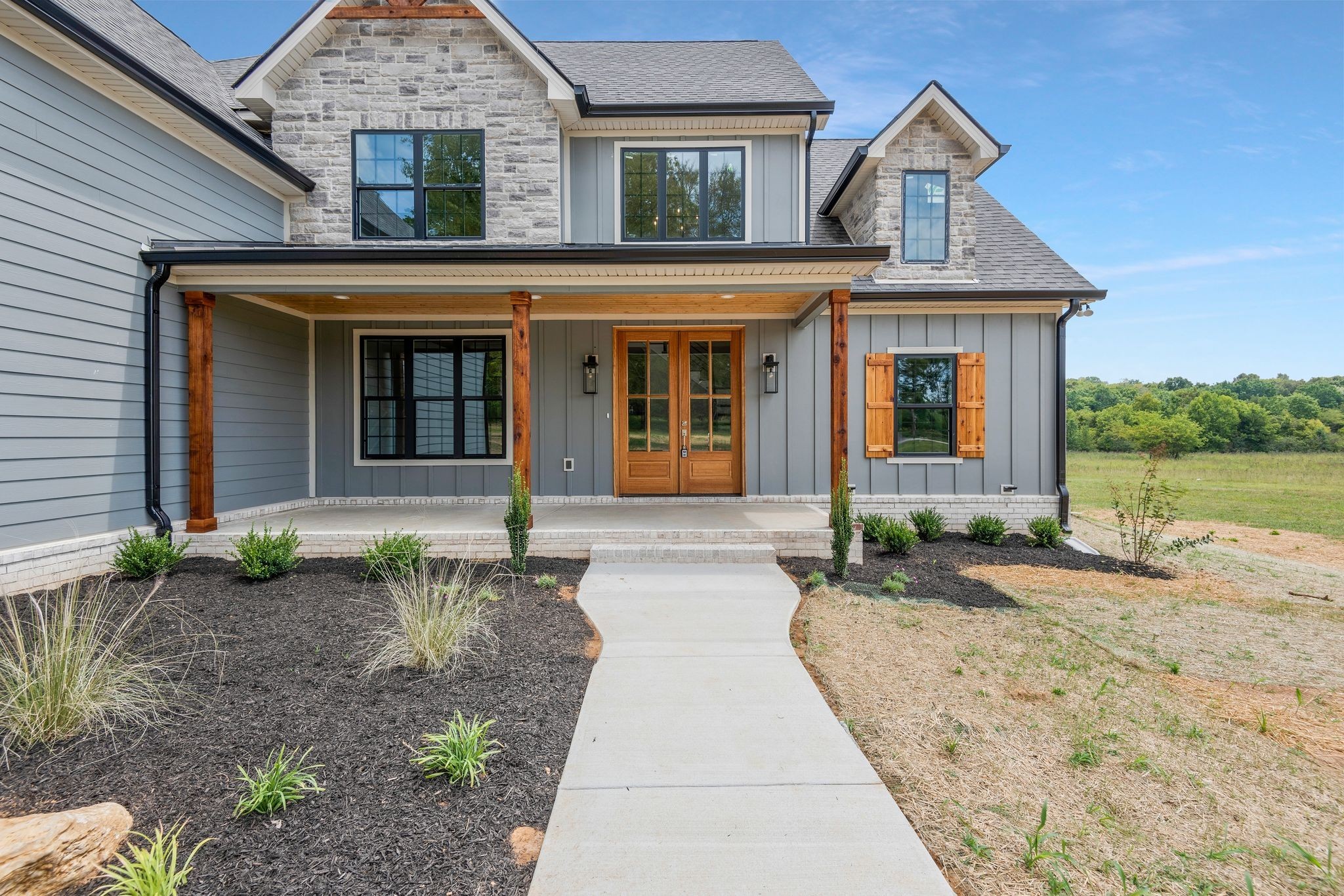 4114 Chicken Road Lebanon, TN 37090 - Photo 3 of 52 a front view of a house with garden