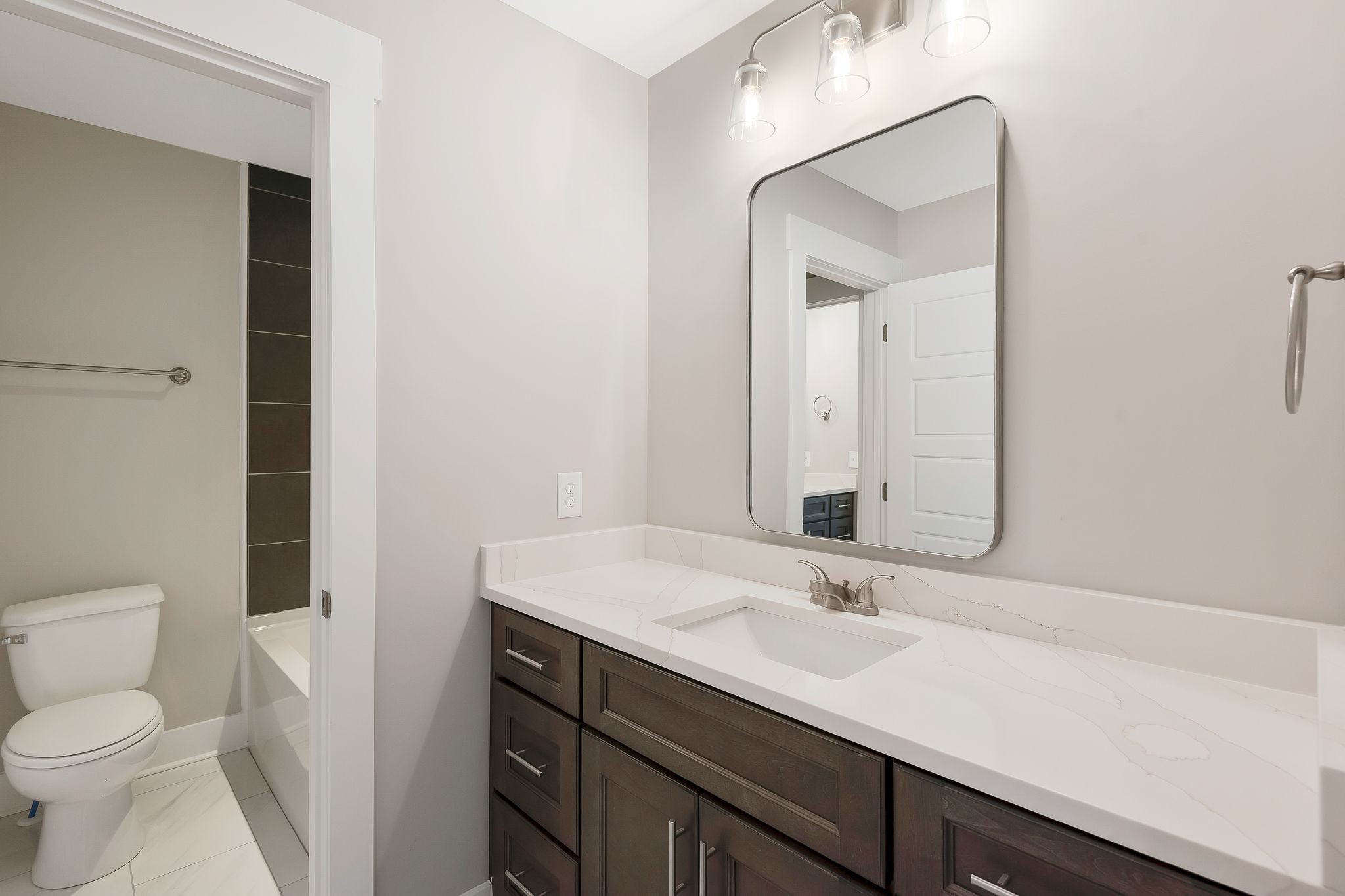 4114 Chicken Road Lebanon, TN 37090 - Photo 36 of 52 a bathroom with a sink a toilet and a mirror