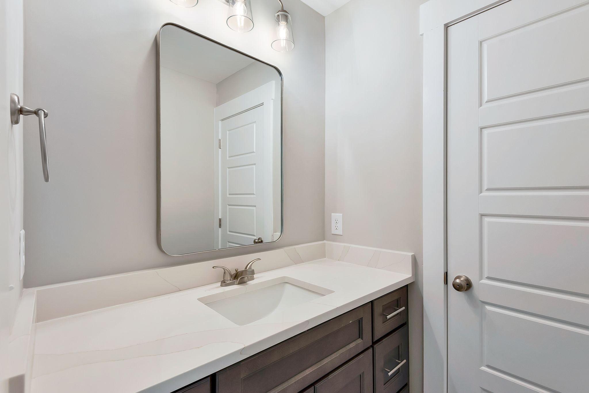 4114 Chicken Road Lebanon, TN 37090 - Photo 38 of 52 a bathroom with a sink and a mirror