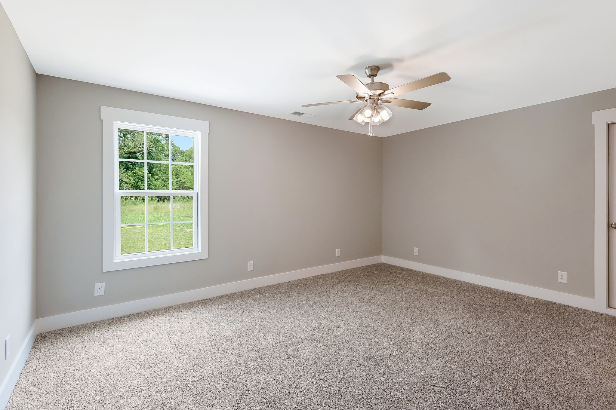 4114 Chicken Road Lebanon, TN 37090 - Photo 39 of 52 an empty room with windows and fan