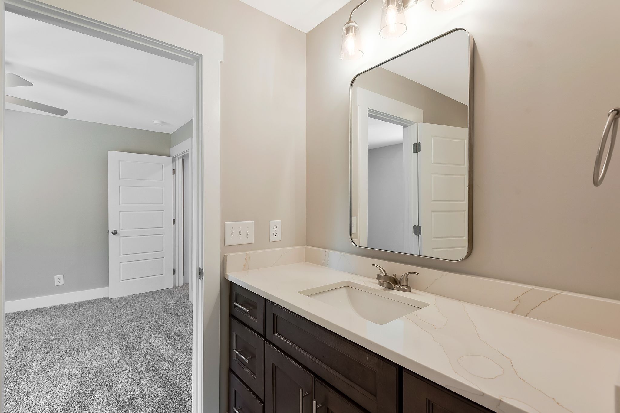 4114 Chicken Road Lebanon, TN 37090 - Photo 44 of 52 a bathroom with a sink and a mirror