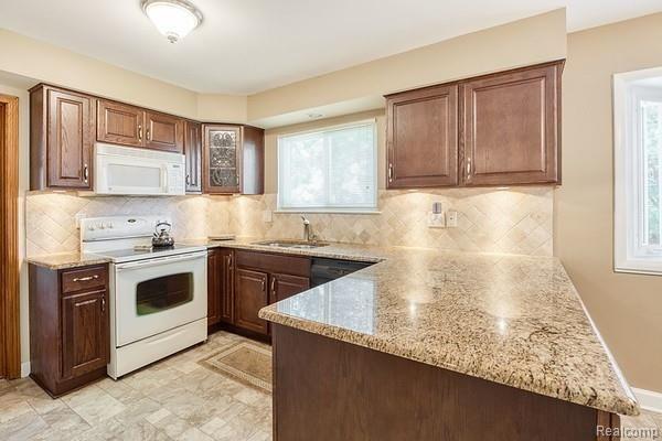 35882 Smithfield Road Farmington, MI 48335 - Photo 7 of 43 Under counter lighting is beautiful at night!