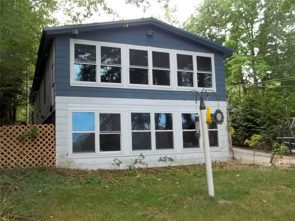115 Shore Road Lyman, ME 04002 - Photo 12 of 18 Front of Home Facing Kennebunk Pond