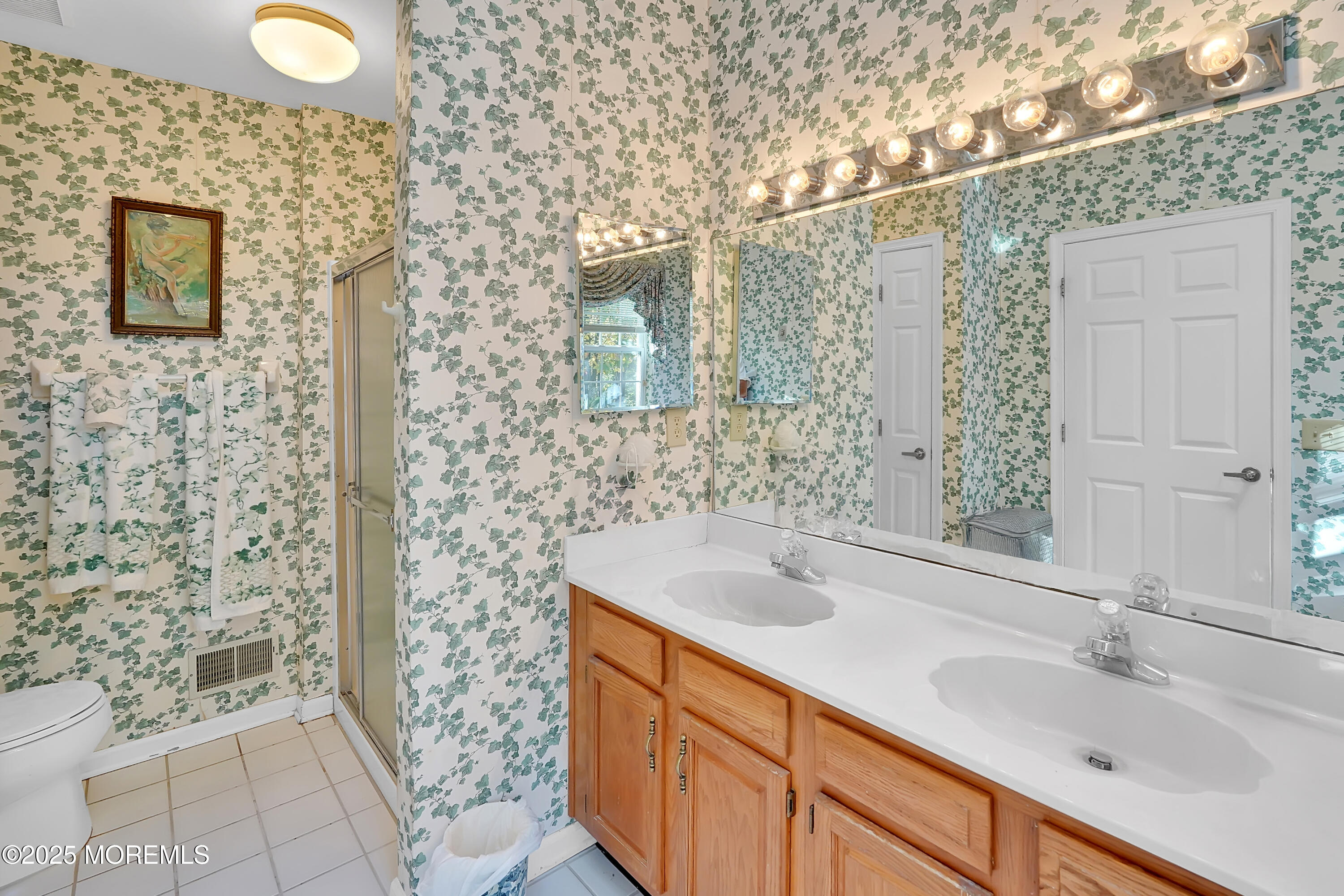 9 Abbot Court Jackson, NJ 08527 - Photo 19 of 47 a bathroom with a sink and a mirror