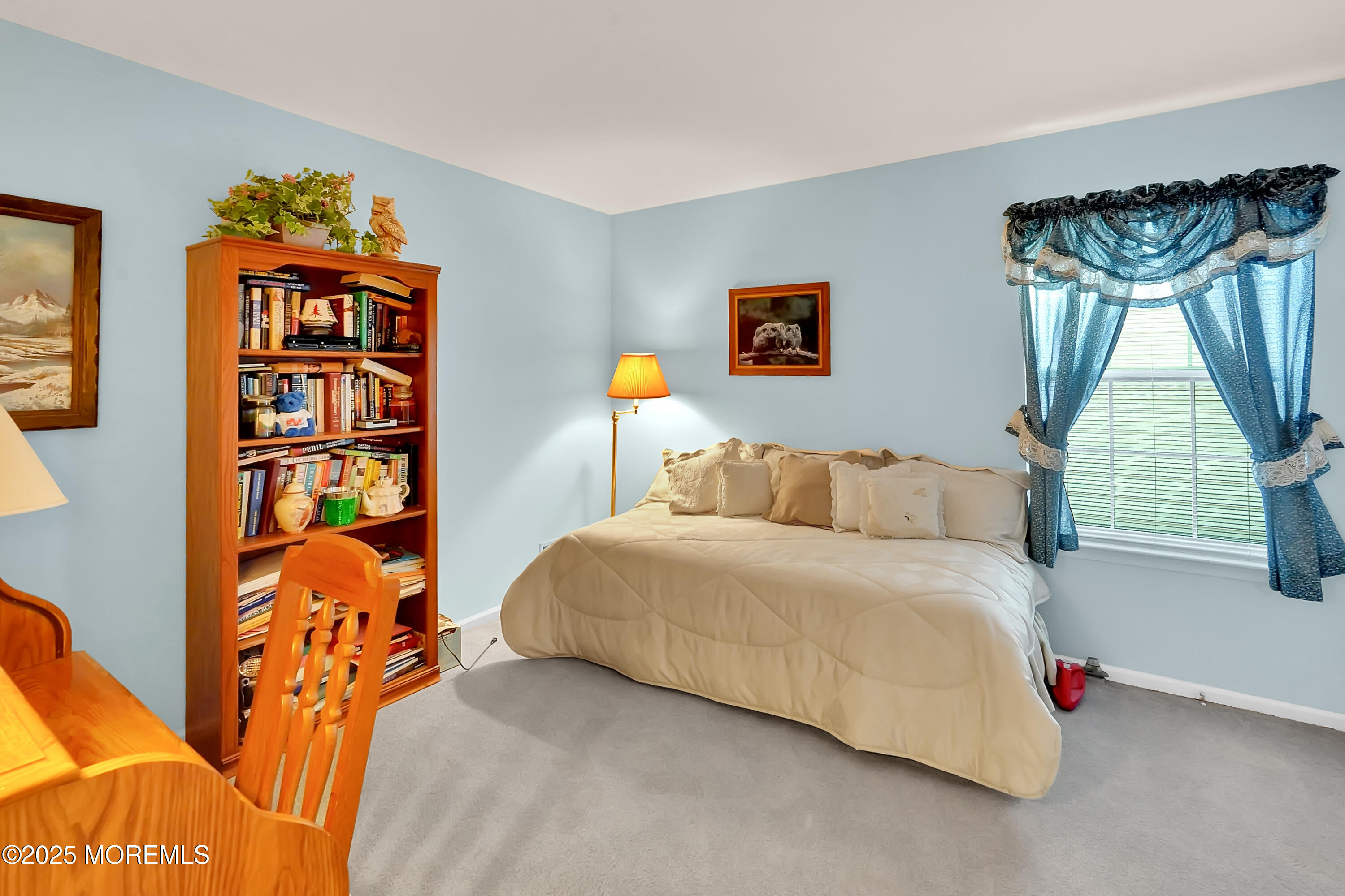 9 Abbot Court Jackson, NJ 08527 - Photo 22 of 47 a bedroom with a bed and a painting on the wall