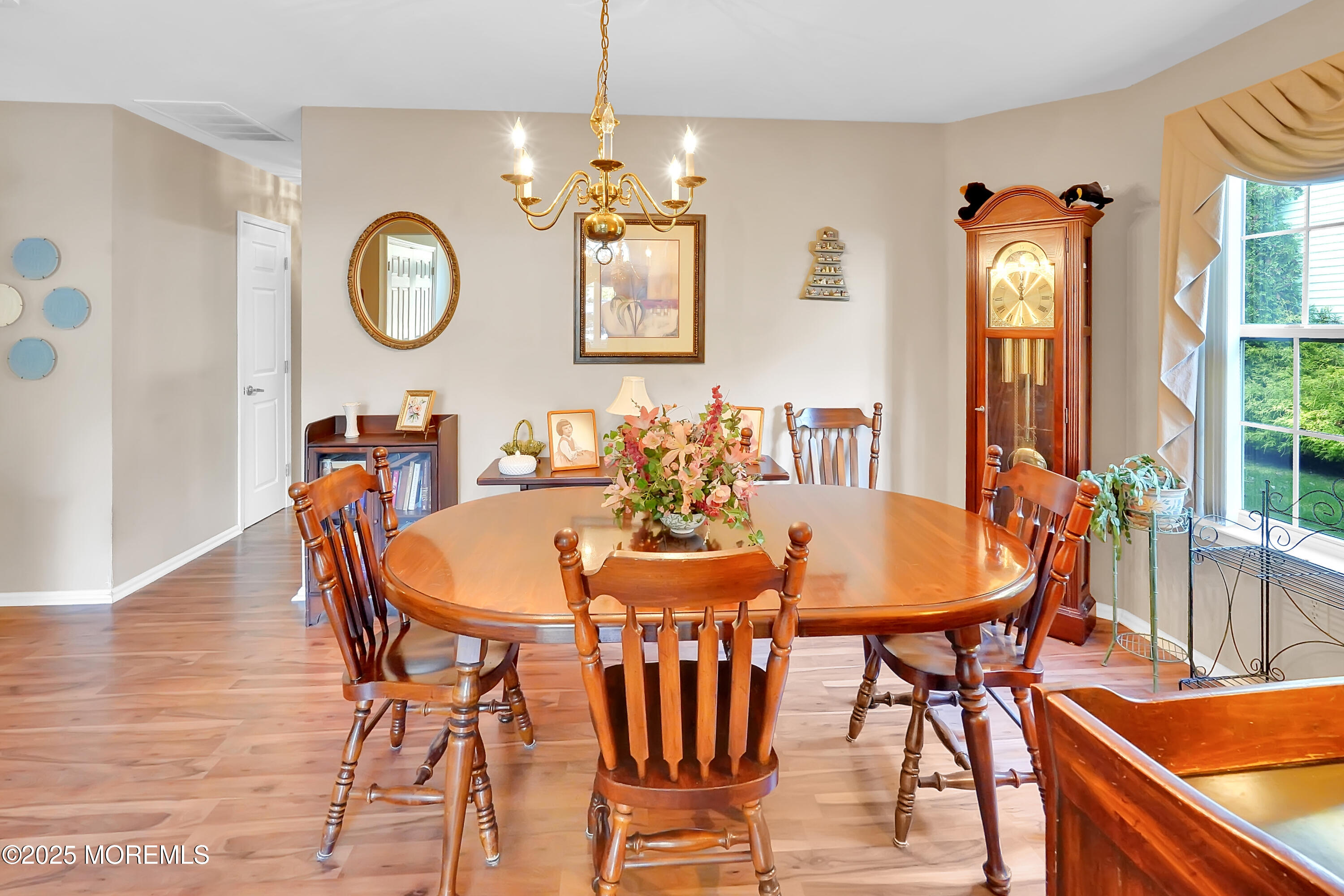 9 Abbot Court Jackson, NJ 08527 - Photo 3 of 47 a dining room with furniture and chandelier