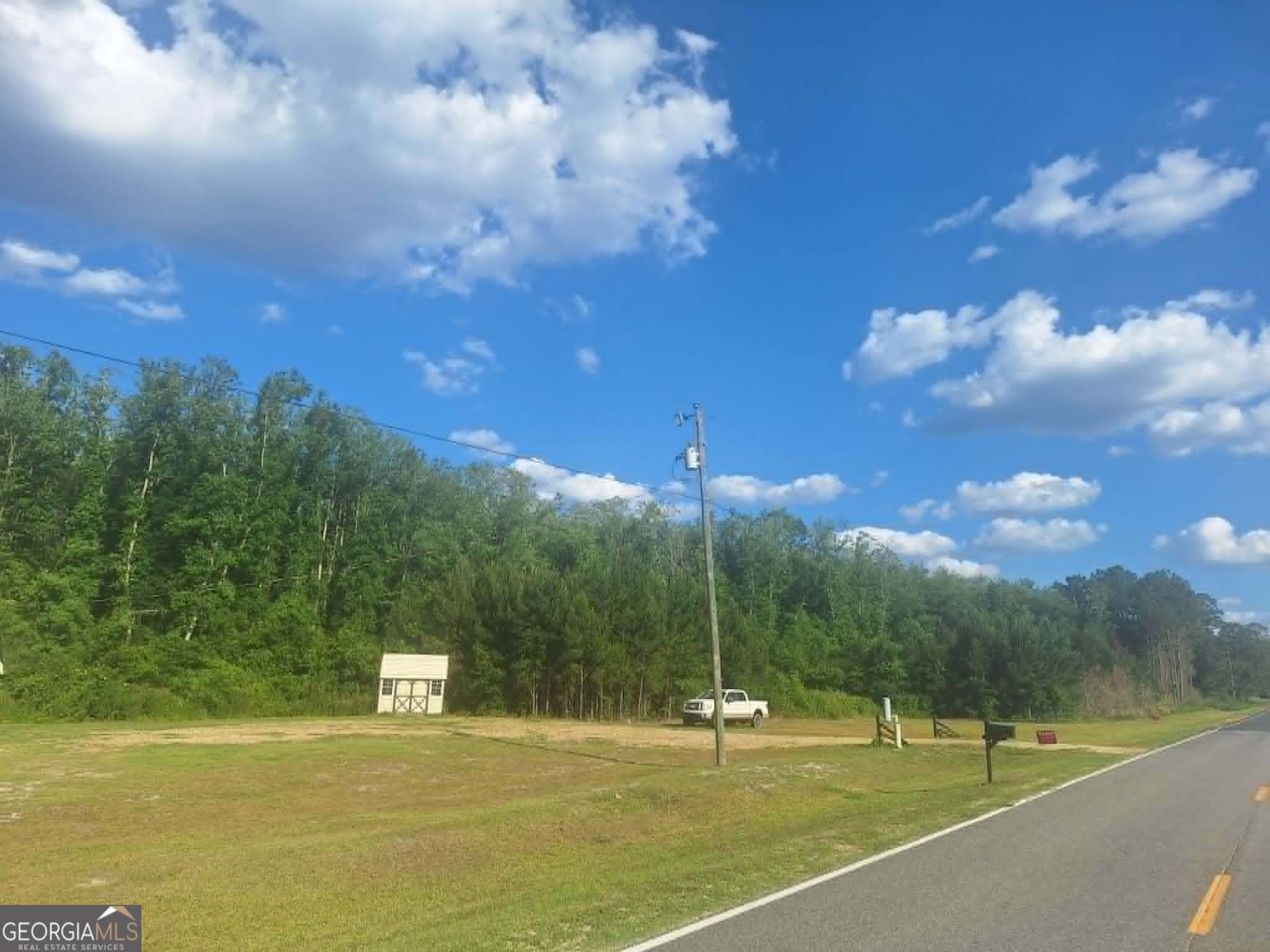 607 Prentiss Road Baxley, GA 31513 - Photo 3 of 4 a view of a tennis court