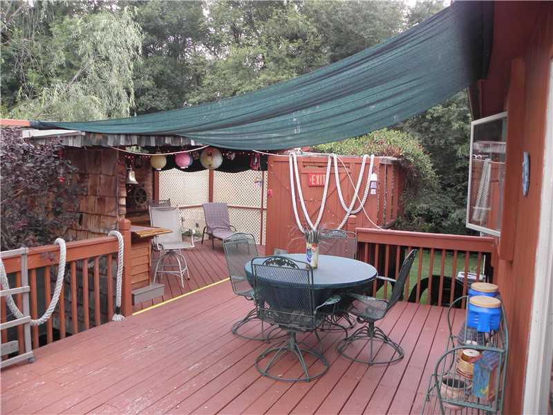 206 Susquehanna Road Monongahela, PA 15063 - Photo 7 of 25 Patio/Deck. Large 19x11 Deck off Kitchen leading to Very Cool 19x9 Covered Deck w/ Brazilian Cherry Wood on Bar