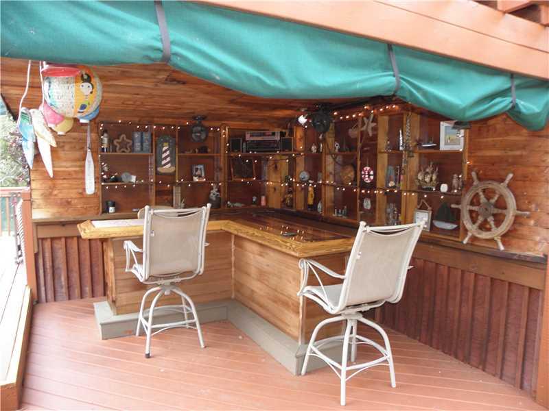 206 Susquehanna Road Monongahela, PA 15063 - Photo 8 of 25 Patio/Deck. Awesome 19x9 Covered Deck w/ Brazilian Cherry Wood Bar & Built-in Display Shelves.
