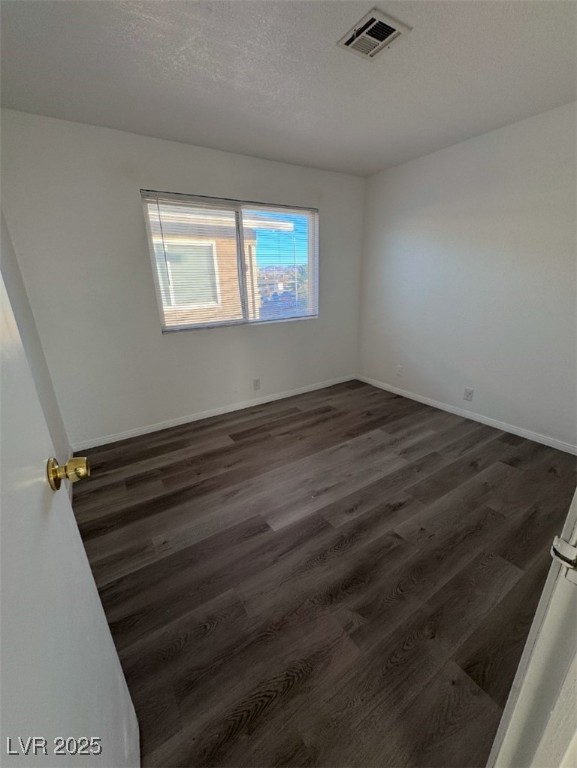 Undisclosed Address Henderson, NV 89011 - Photo 6 of 8 Unfurnished room featuring visible vents, baseboar