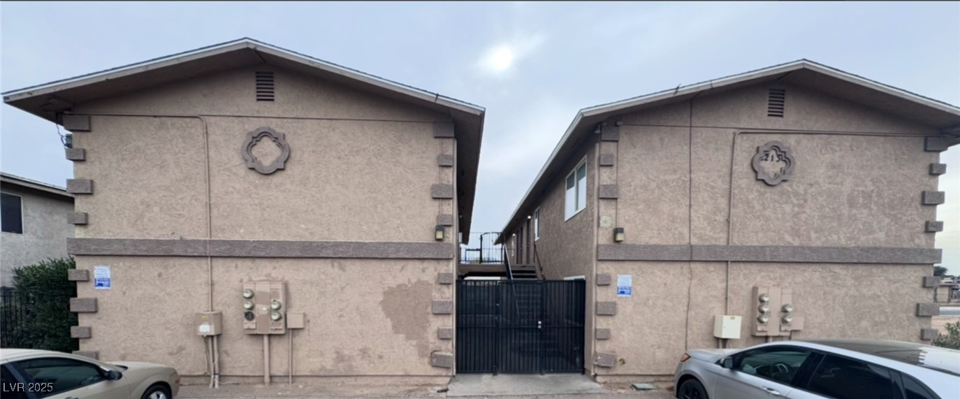 Undisclosed Address Henderson, NV 89011 - Photo 8 of 8 View of home's exterior featuring stucco siding