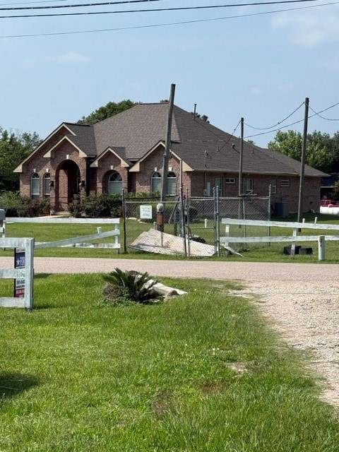 5023 Quail West Road Alvin, TX 77511 - Photo 6 of 22 Brick home across street