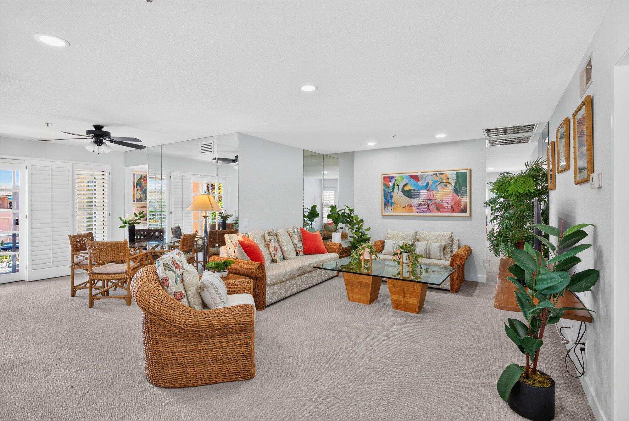 500 East Amado Road, Unit 313 Palm Springs, CA 92262 - Photo 9 of 32 a living room with furniture and a potted plant