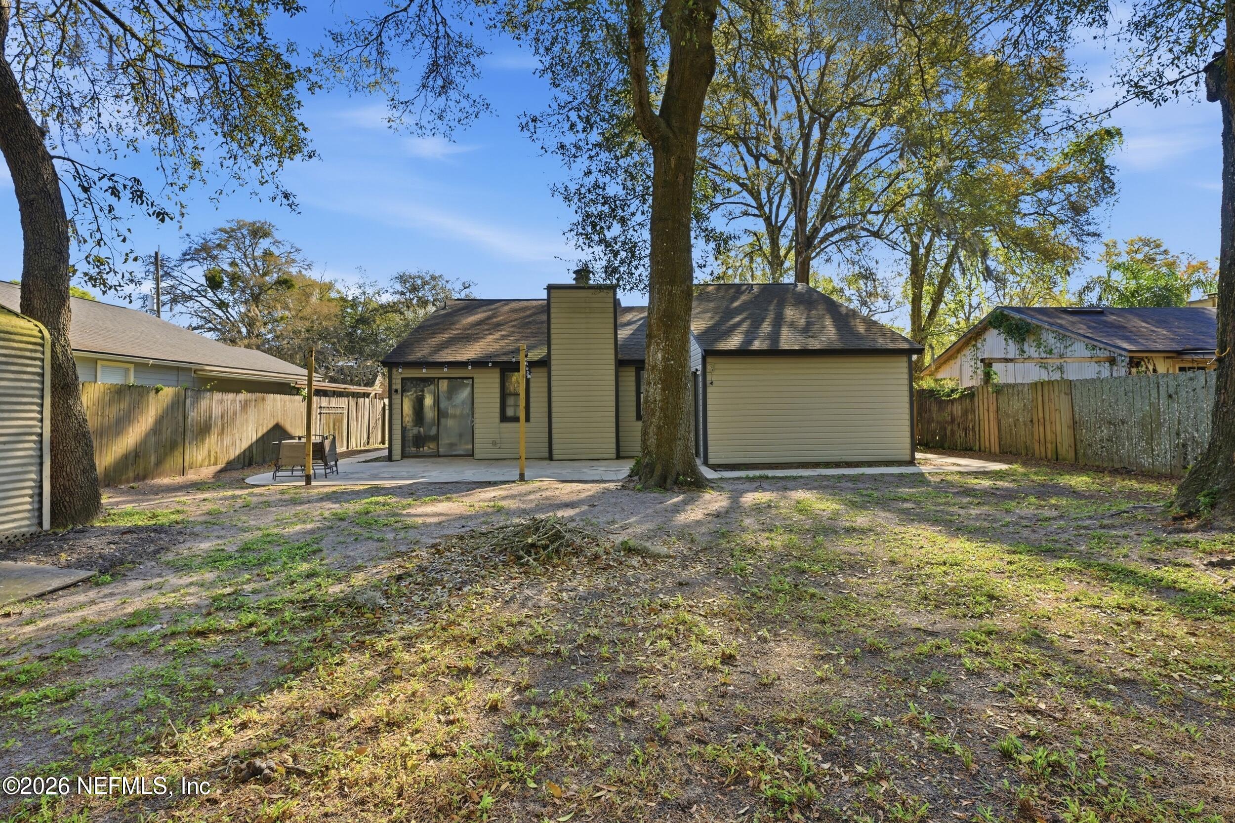 12890 Attrill Road Jacksonville, FL 32258 - Photo 22 of 29 a view of a house with a yard