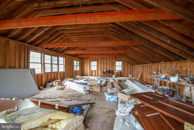 a bathroom with a sink toilet and mirror