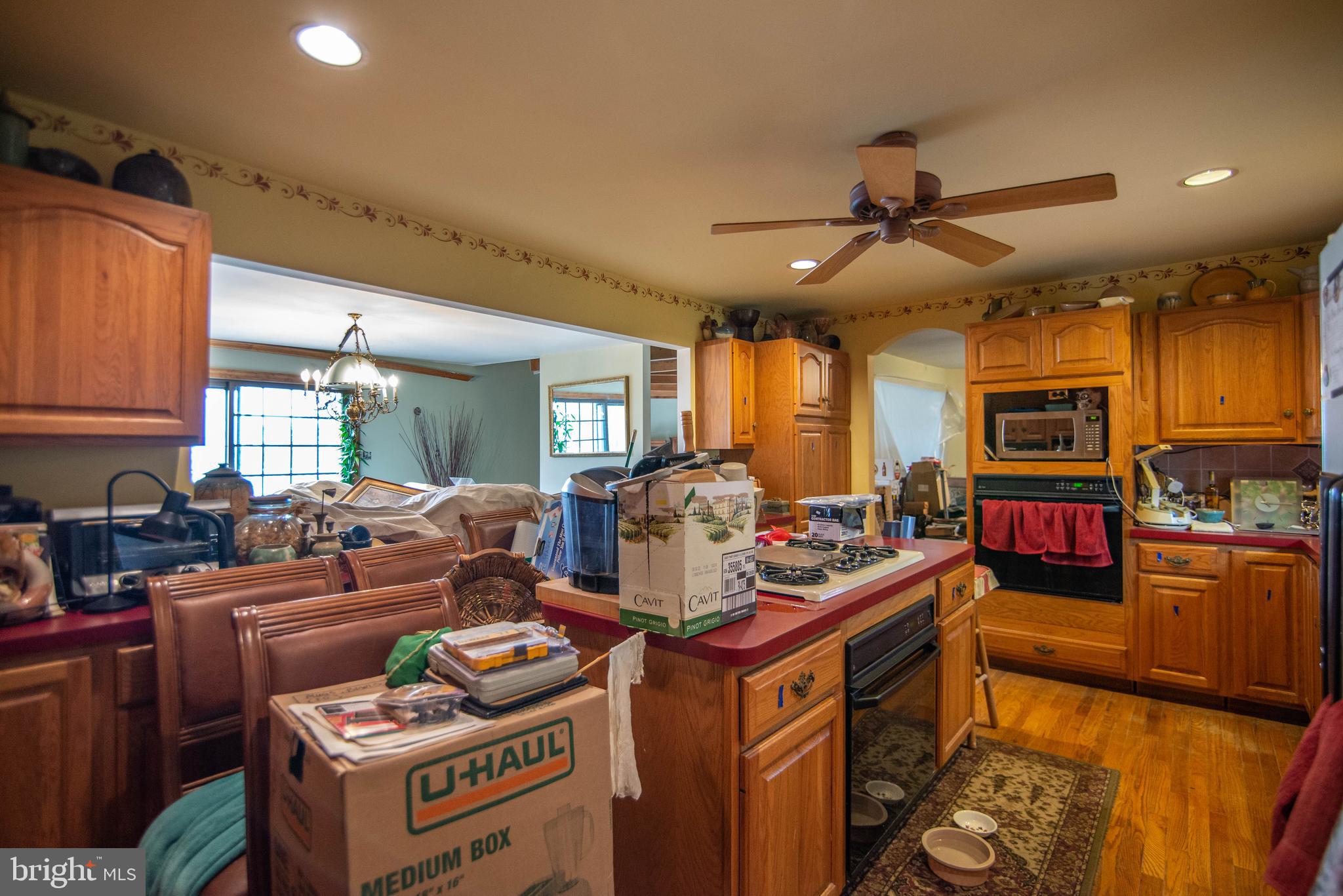38 Osprey Way Elkton, MD 21921 - Photo 16 of 52 a view of a kitchen with stainless steel appliances granite countertop a stove and a refrigerator